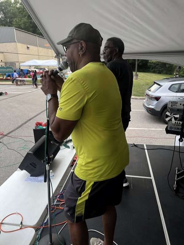 Starban vocalist checking mic at soundcheck